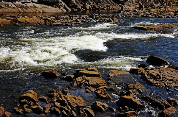 Rapids And Rocks by Deb Oppermann